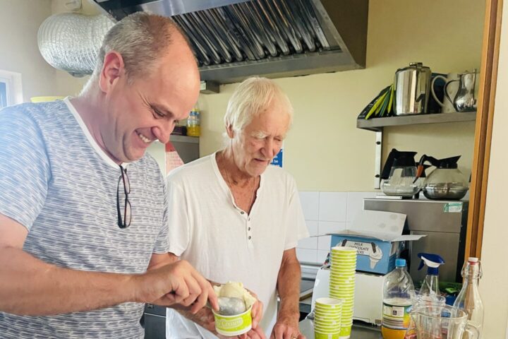 Friends talking over coffee after a gathering